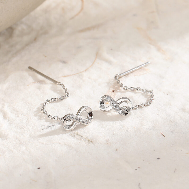 SWIRLUXE SILVER INFINITY EARRINGS - Image 2