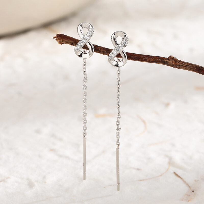 SWIRLUXE SILVER INFINITY EARRINGS - Image 3